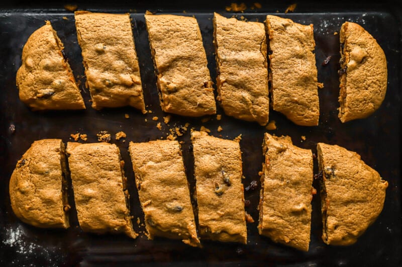 A baking sheet with sliced cookies on it.