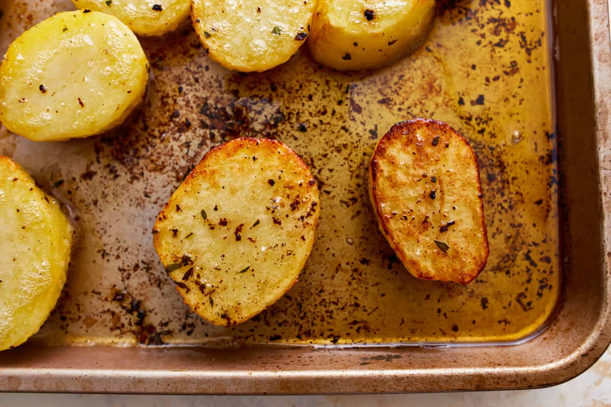 Roasted potatoes on a baking sheet.