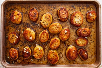 Roasted potatoes on a baking sheet.