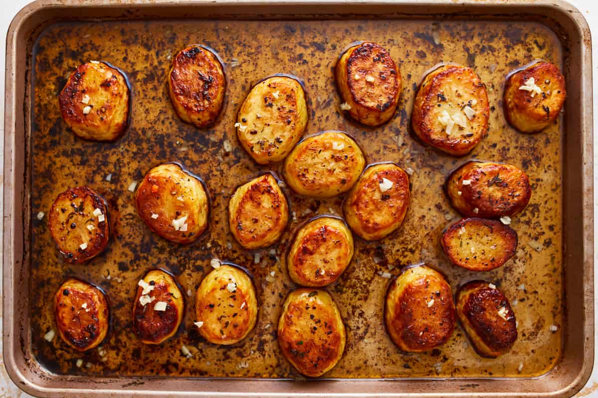 Roasted potatoes on a baking sheet.