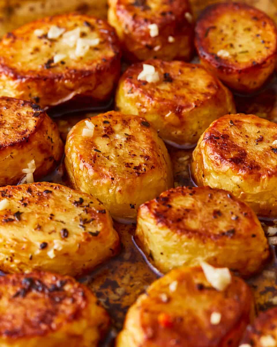 Roasted potatoes on a baking sheet.