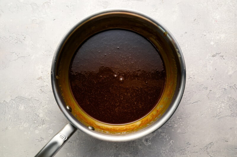 sticky toffee sauce in a stainless saucepan.