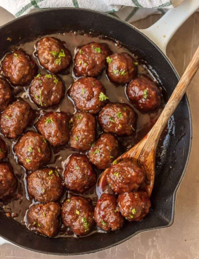 SWEET & SPICY CRANBERRY COCKTAIL MEATBALLS are the perfect holiday appetizer! Cooked in a cranberry pepper jelly sauce; SO delicious! The best Thanksgiving, Christmas, or New Years Eve appetizer!