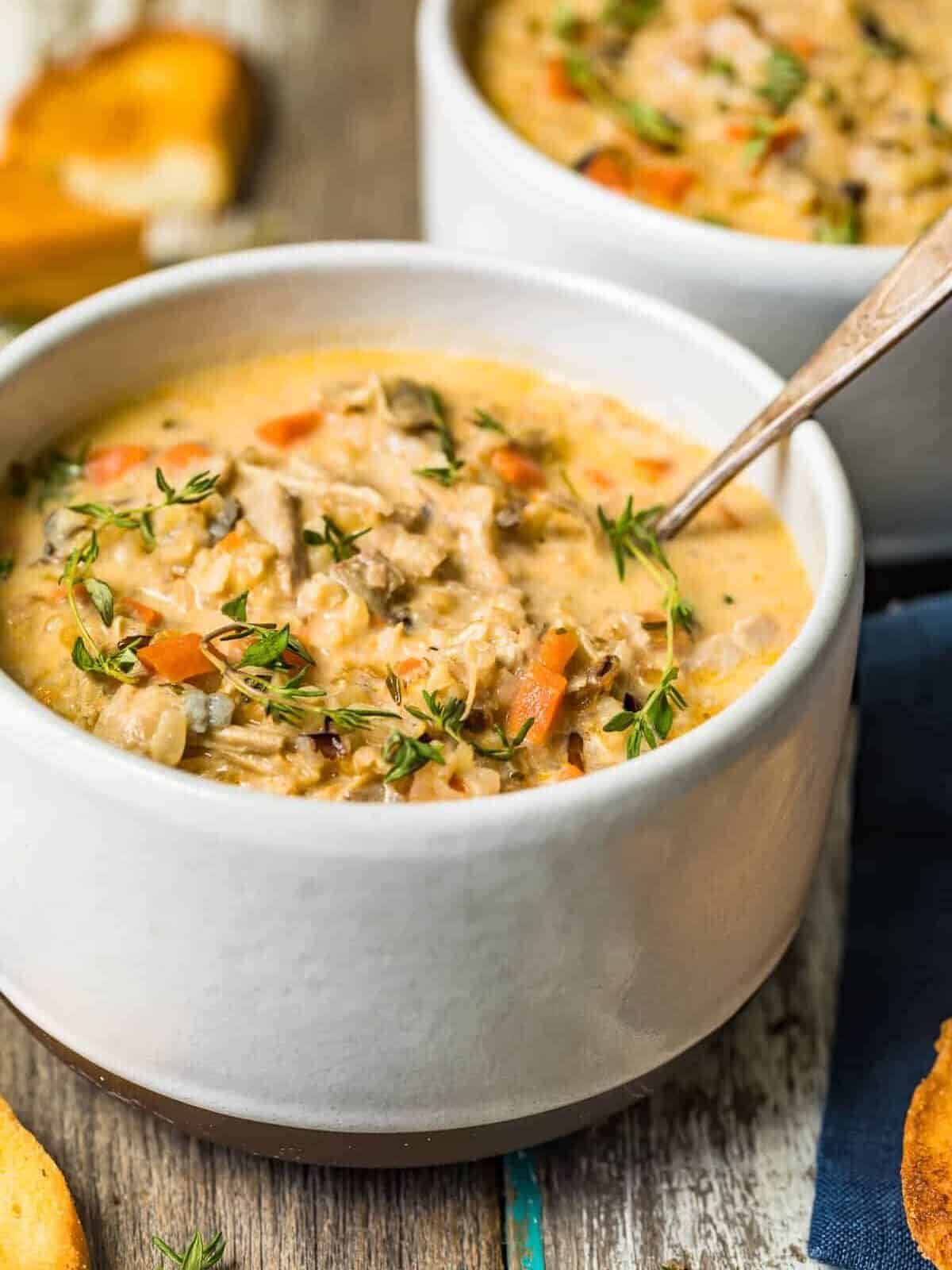 Soup served in a white bowl with a spoon