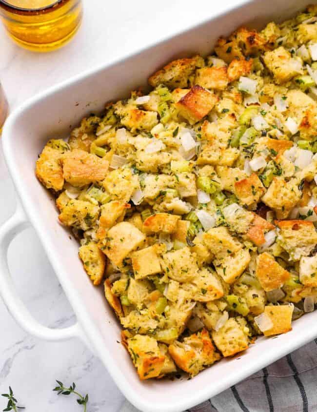 overhead view of vegetarian stuffing in a white baking dish.