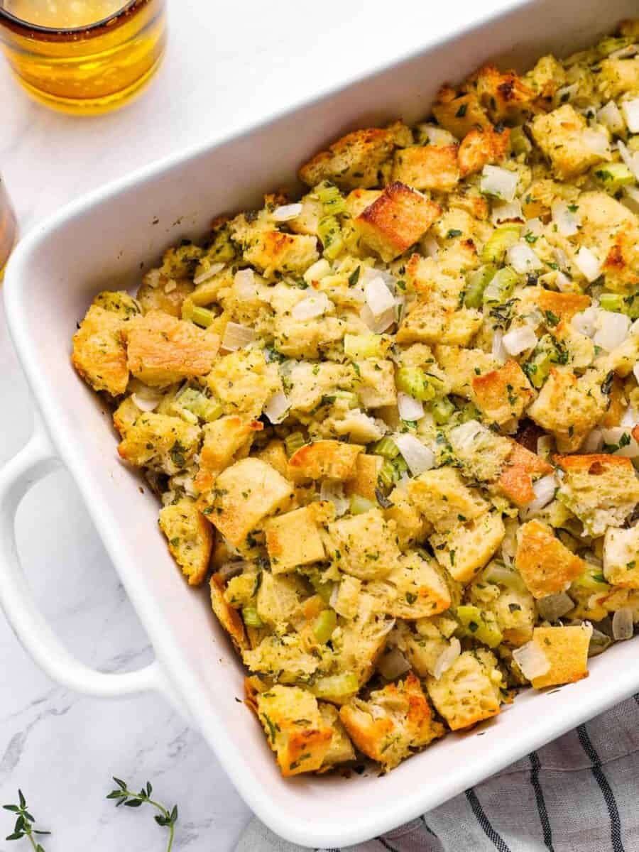 overhead view of vegetarian stuffing in a white baking dish.