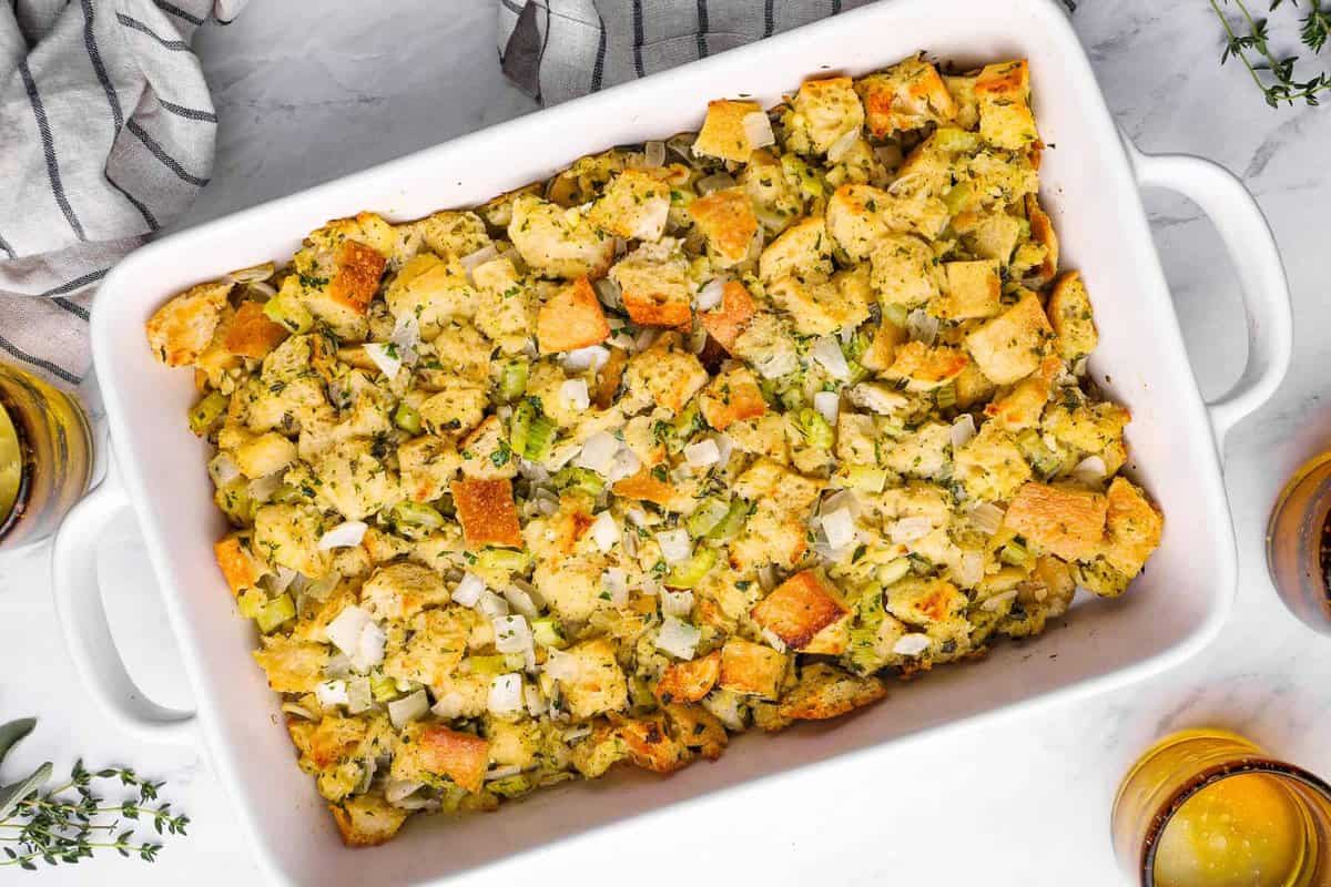 overhead view of vegetarian stuffing in a white baking dish.