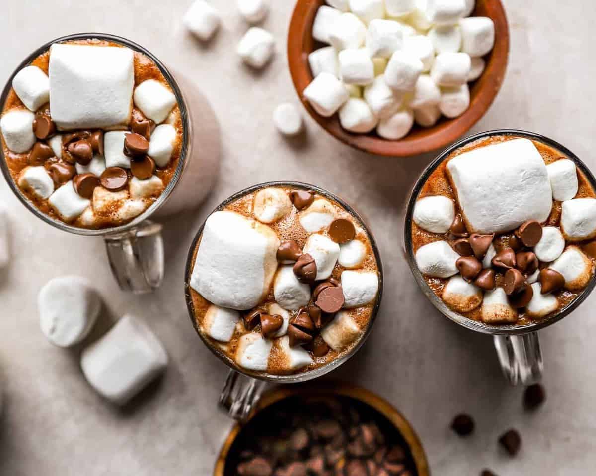 Mugs of hot chocolate with marshmallows.