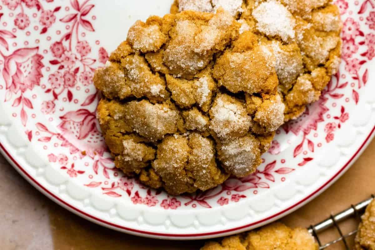 ginger crinkle cookies on red and white plate