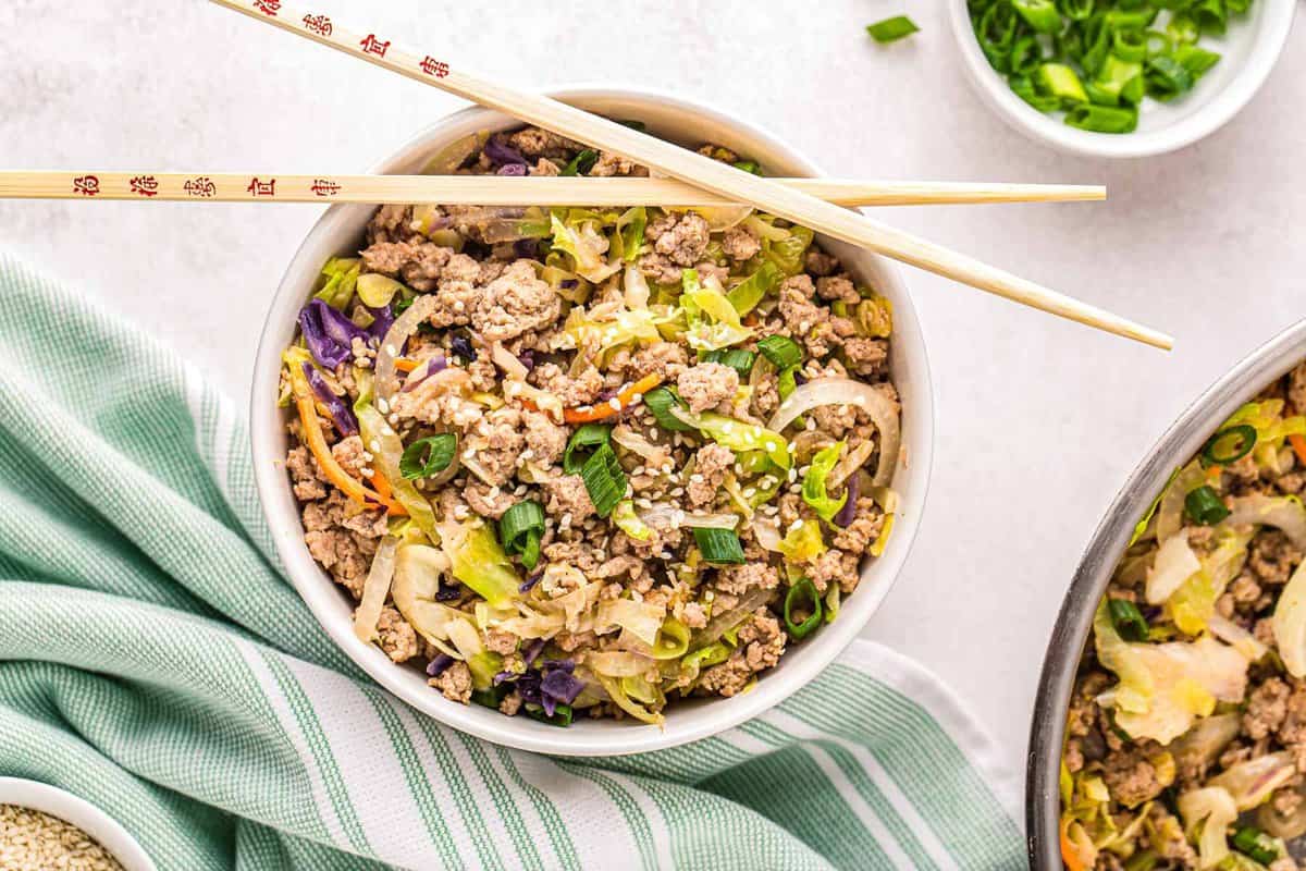 egg roll in a bowl with chopsticks