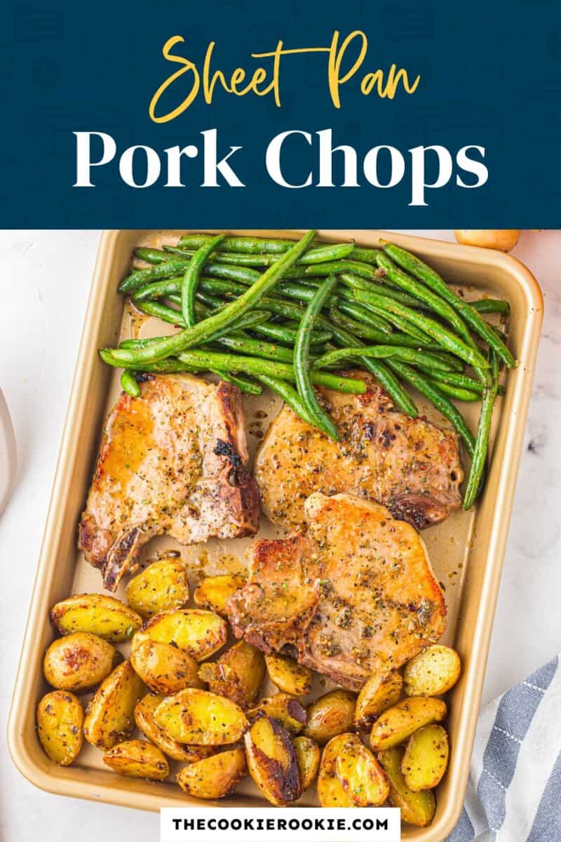Pork chops in a sheet pan with green beans and potatoes.