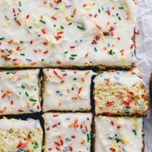close up view of partially cut funfetti cake.