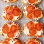 overhead view of 8 slices of texas toast pizza on parchment paper.