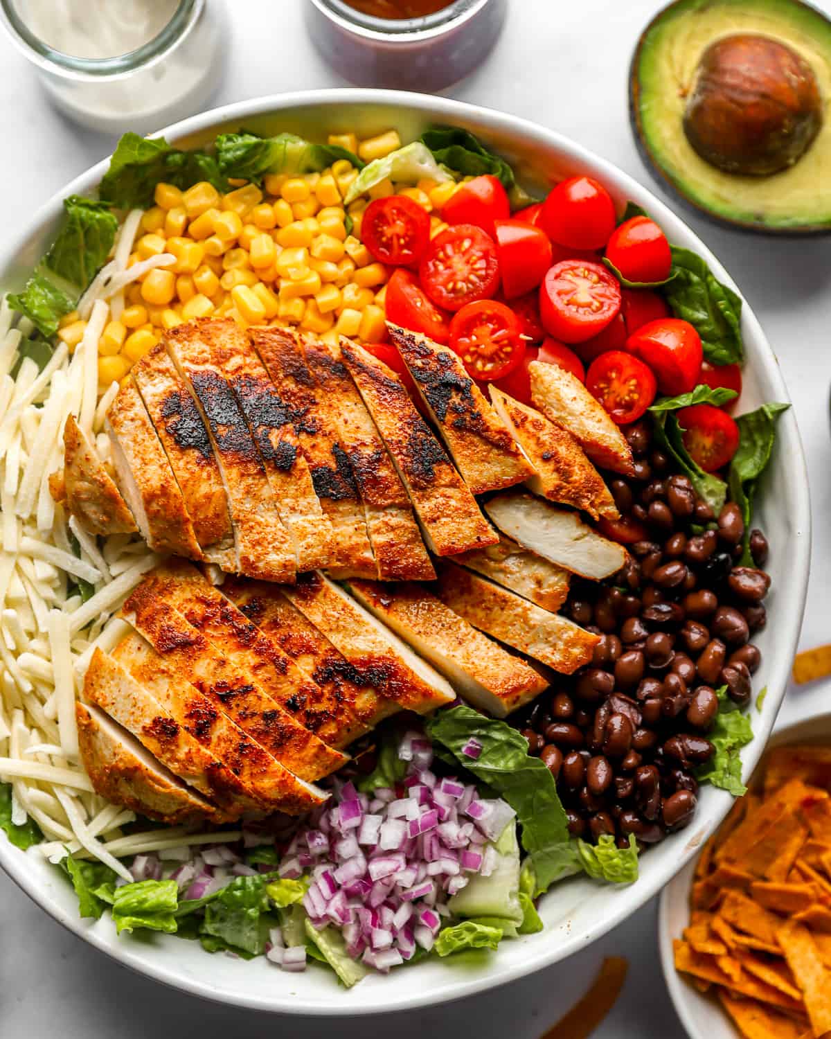 ingredients for bbq chicken salad in a bowl