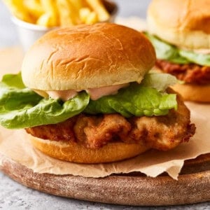 side view of a chicken fried steak sandwich.