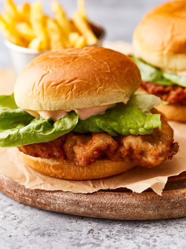 side view of a chicken fried steak sandwich.