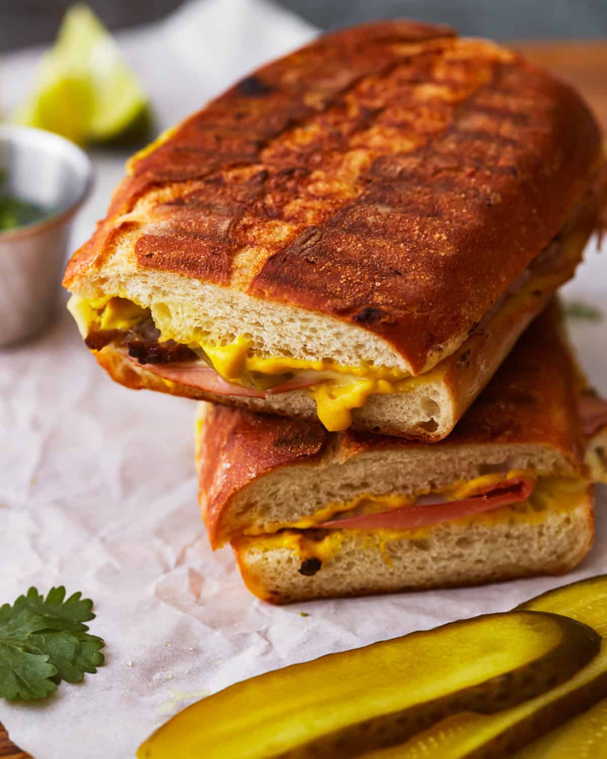 2 stacked halves of a cuban sandwich.