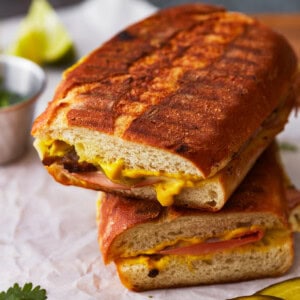 2 stacked halves of a cuban sandwich.