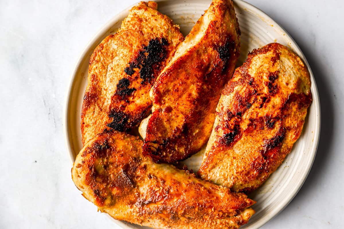 chicken breasts on white plate