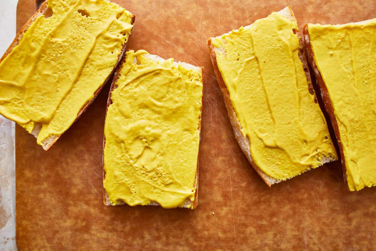 cuban bread spread with mayo-mustard sauce.