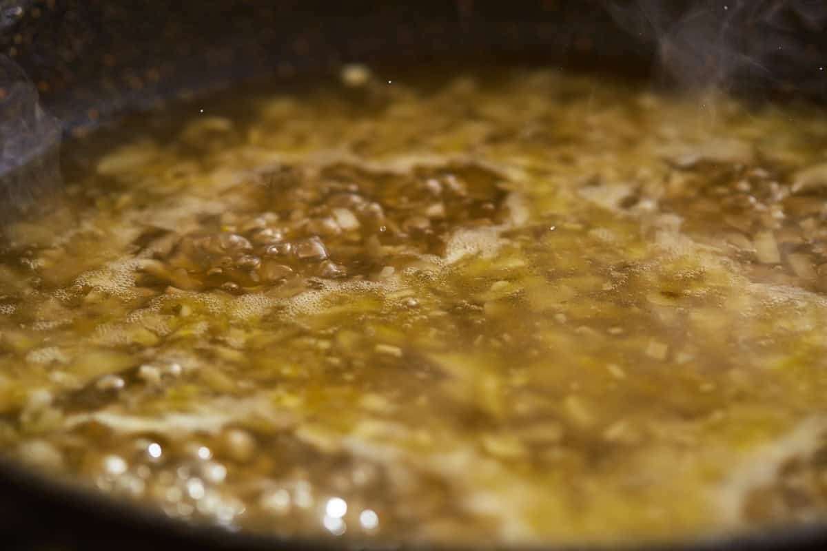 deglazing a pan with wine.
