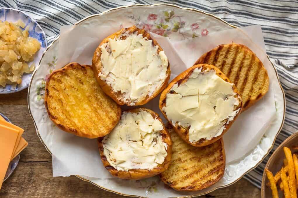 Burger buns covered in butter