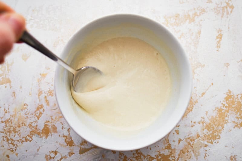 thickened flour in a white bowl.