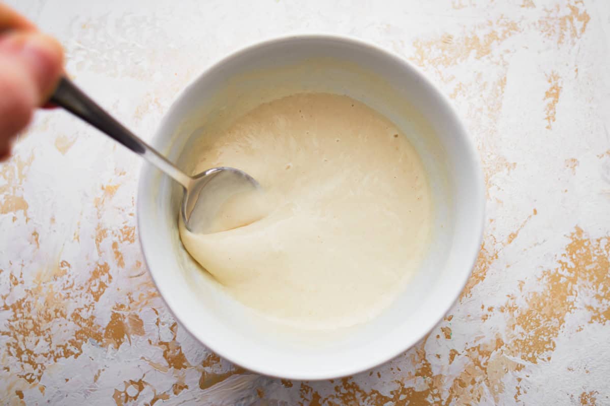 thickened flour in a white bowl.