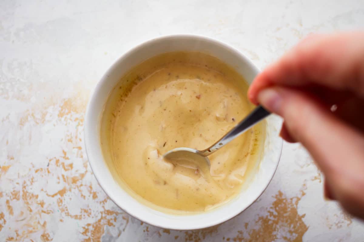 thickened roux in a white bowl.