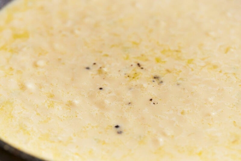creamy lemon sauce in a pan.