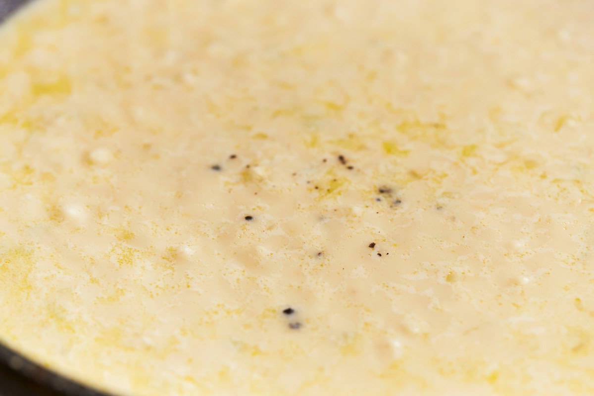 creamy lemon sauce in a pan.