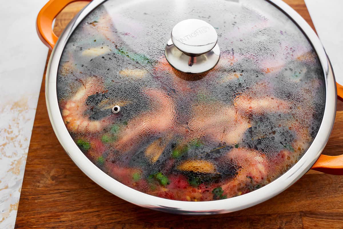 a covered pan of paella.