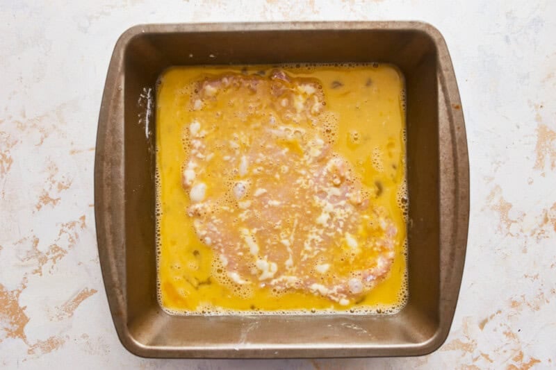 a thin floured pork cutlet dipped in egg.