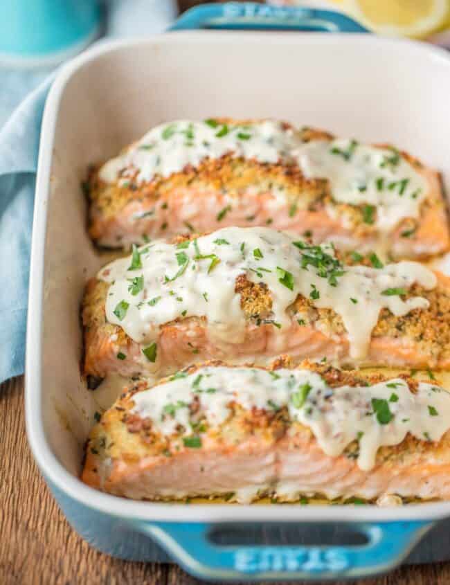 PARMESAN CRUSTED WHITE WINE DIJON SALMON is our very favorite way to enjoy seafood! Salmon coated with a crispy garlic parmesan crust and drenched in an amazing white wine dijon. TO DIE FOR!