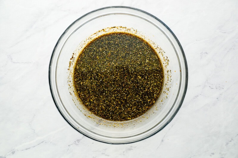 Honey balsamic marinade in a glass mixing bowl.