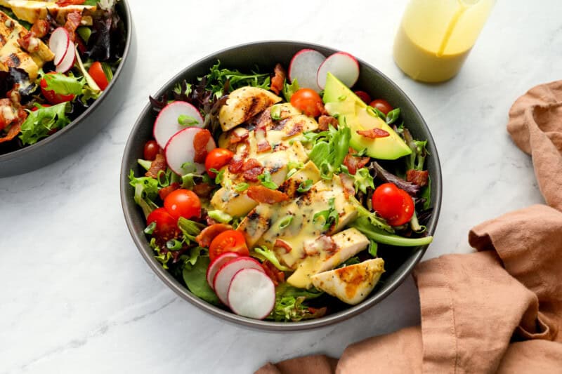 assembled honey mustard chicken salad in a bowl.