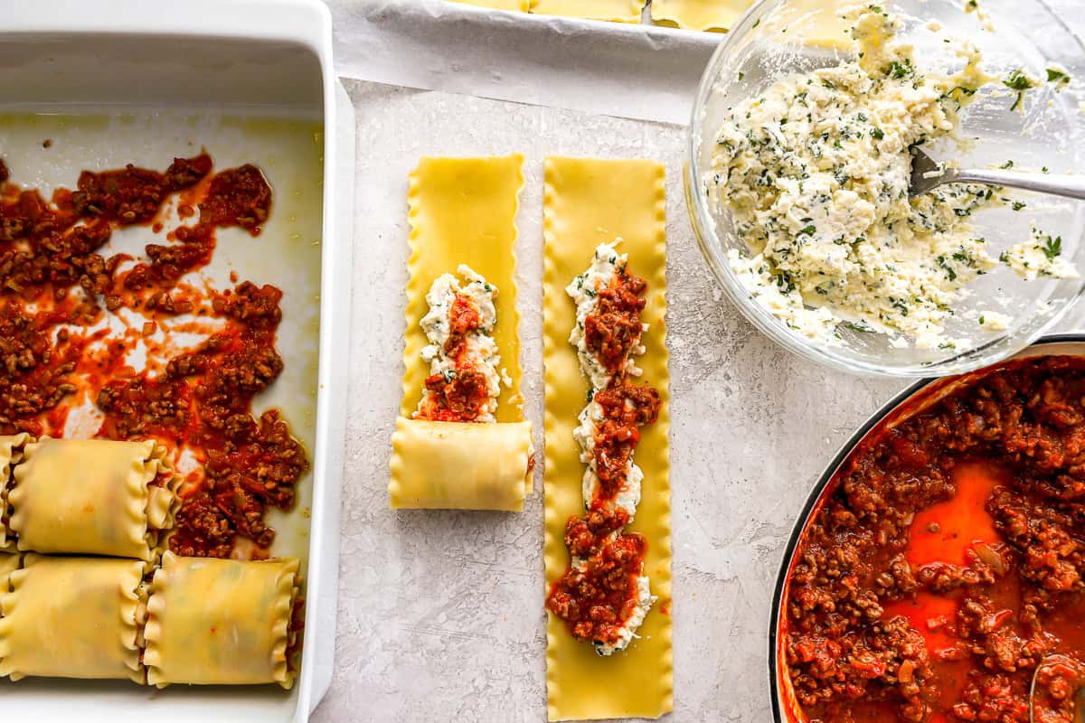 filling and rolling lasagna noodles.