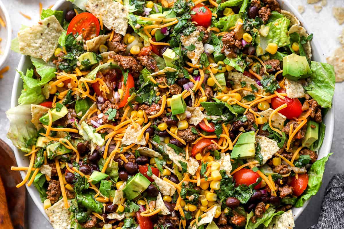 close up view of taco salad in a bowl.