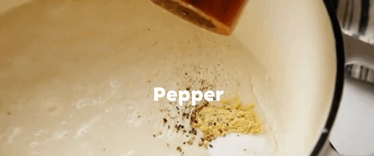 Adding seasoning to the sauce.