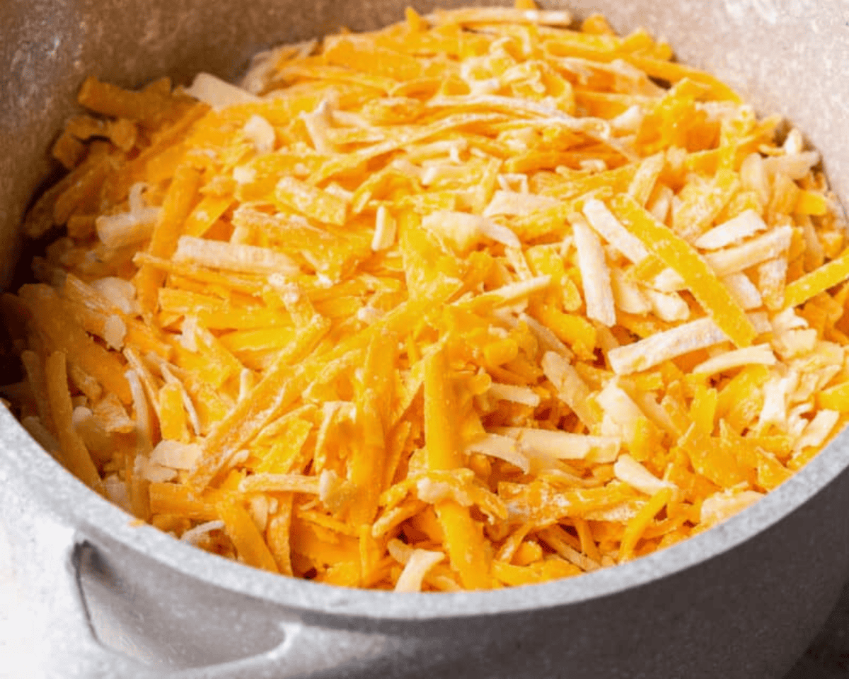 pot filled of shredded cheese