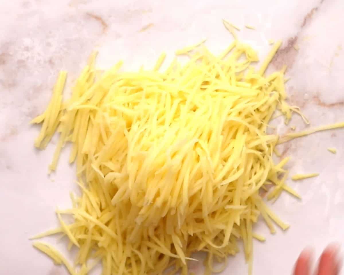 Mandoline-cut shoestring potatoes.
