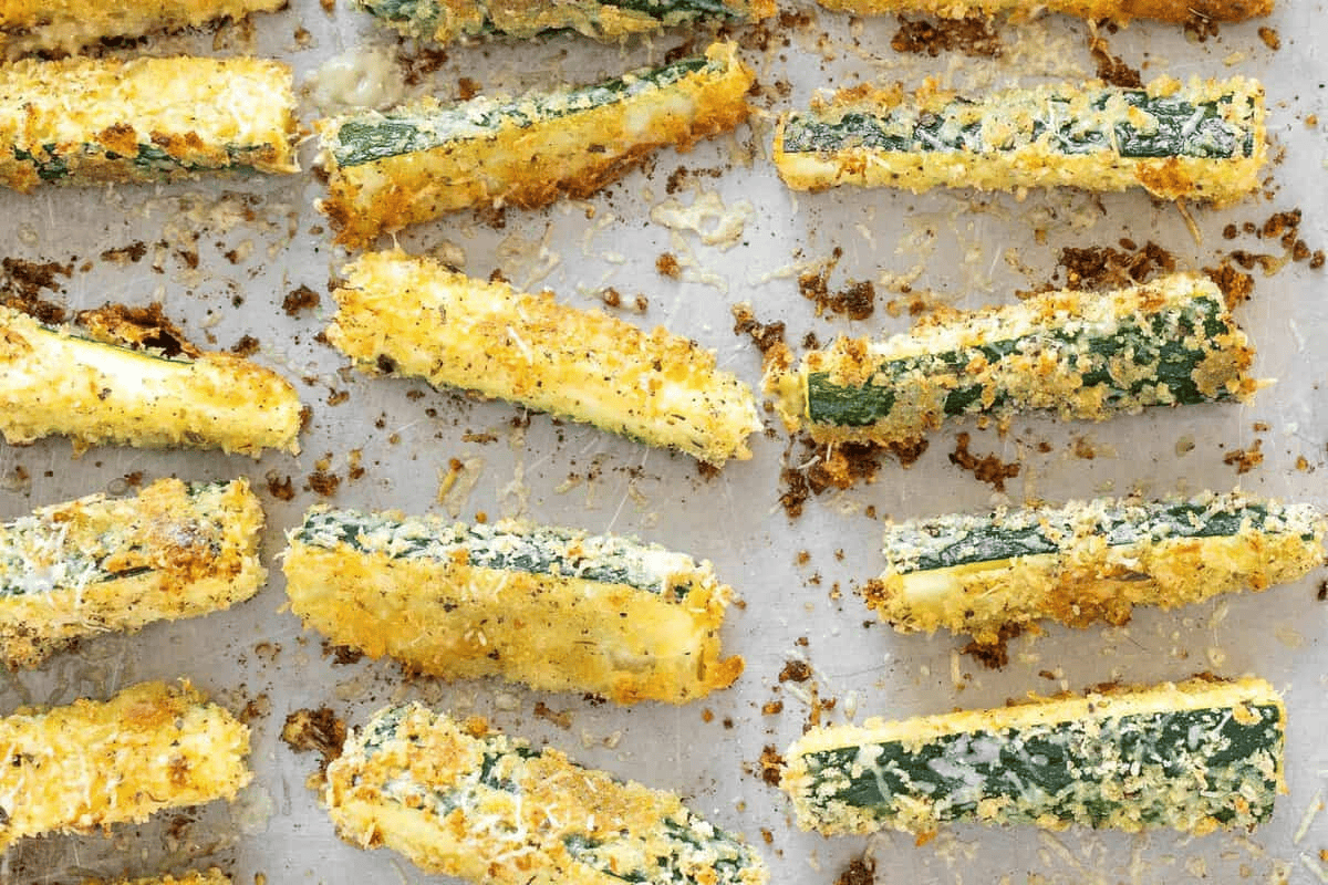 Zucchini fries on a cookie sheet. 