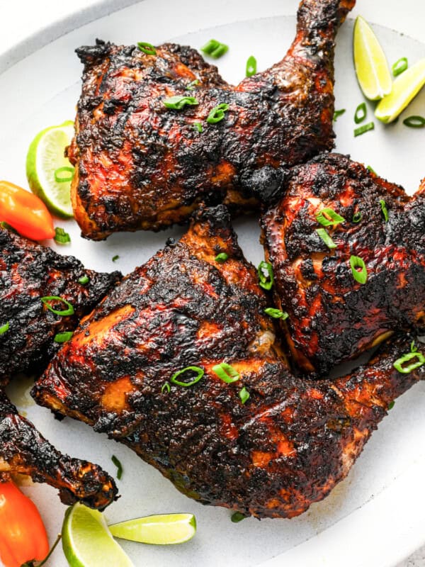 jerk chicken topped with scallions.