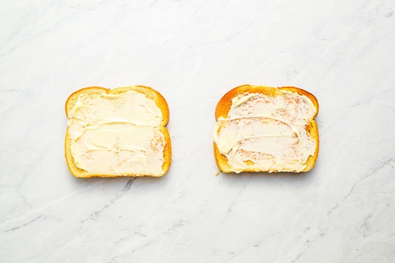 2 slices of mayo-coated toasted bread.