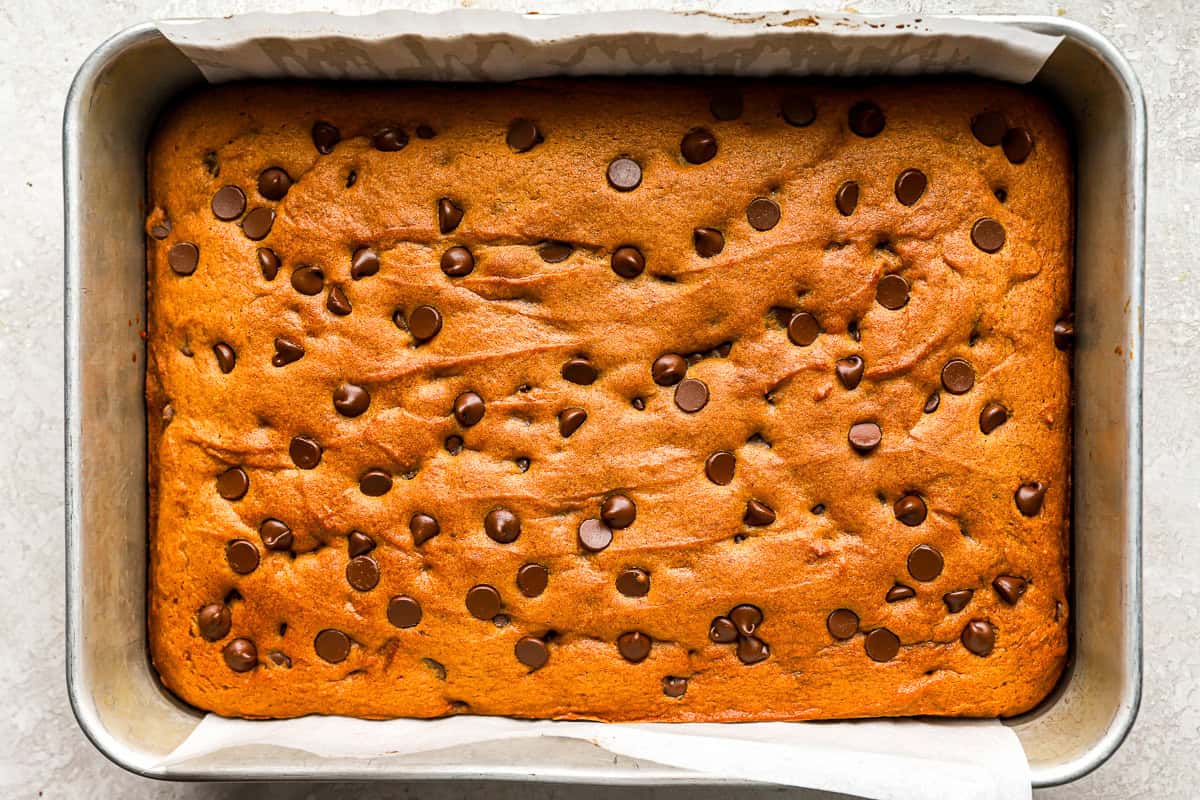 baked pumpkin cookie bars in a baking pan.