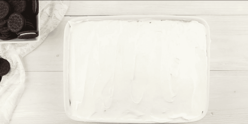 Whipped topping on poke cake.