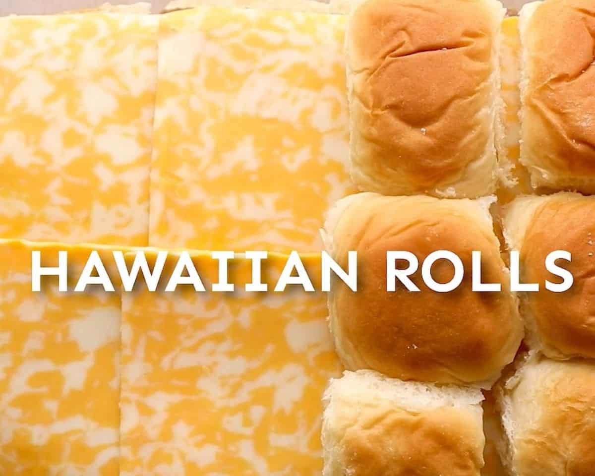 Layering the rolls with cheese and the top bun. 