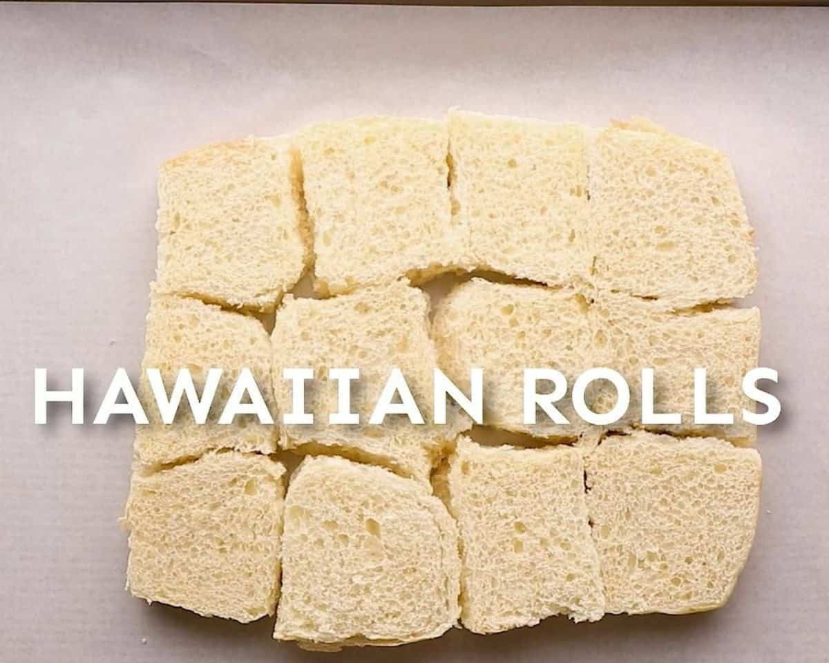 Hawaiian rolls on a baking sheet. 