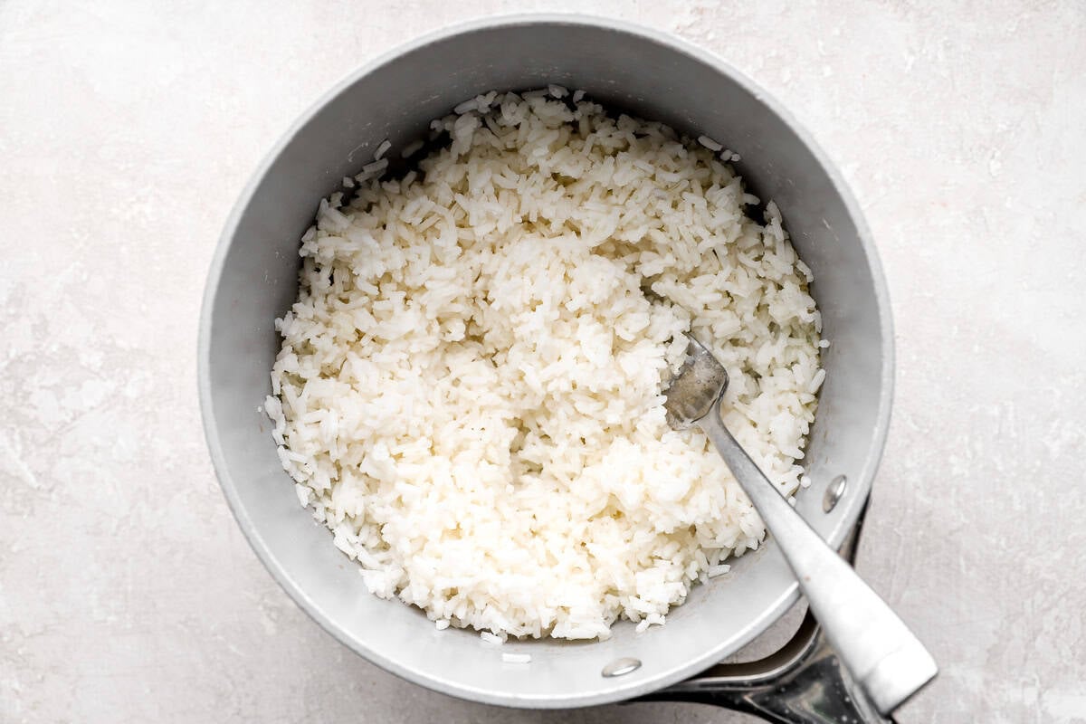 Cooked white rice ready to be added to stuffed pepper soup