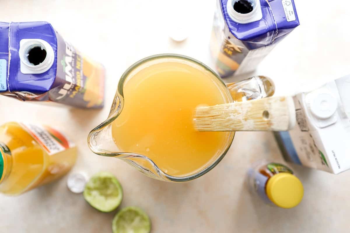 overhead view of fruit punch being mixed together